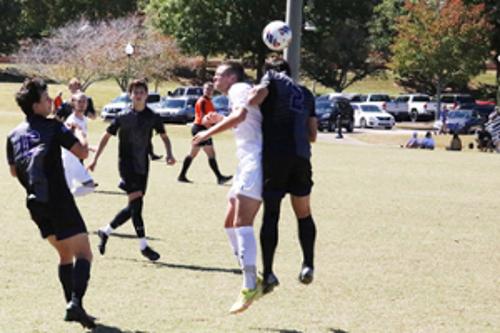 Men playing soccer